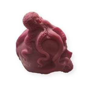Skull and octopus candle